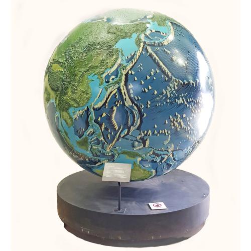 A unique 78 inches (2 meters) diameter relief globe shows the physical features under the oceans.