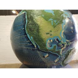 A unique 78 inches (2 meters) diameter relief globe shows the physical features under the oceans.