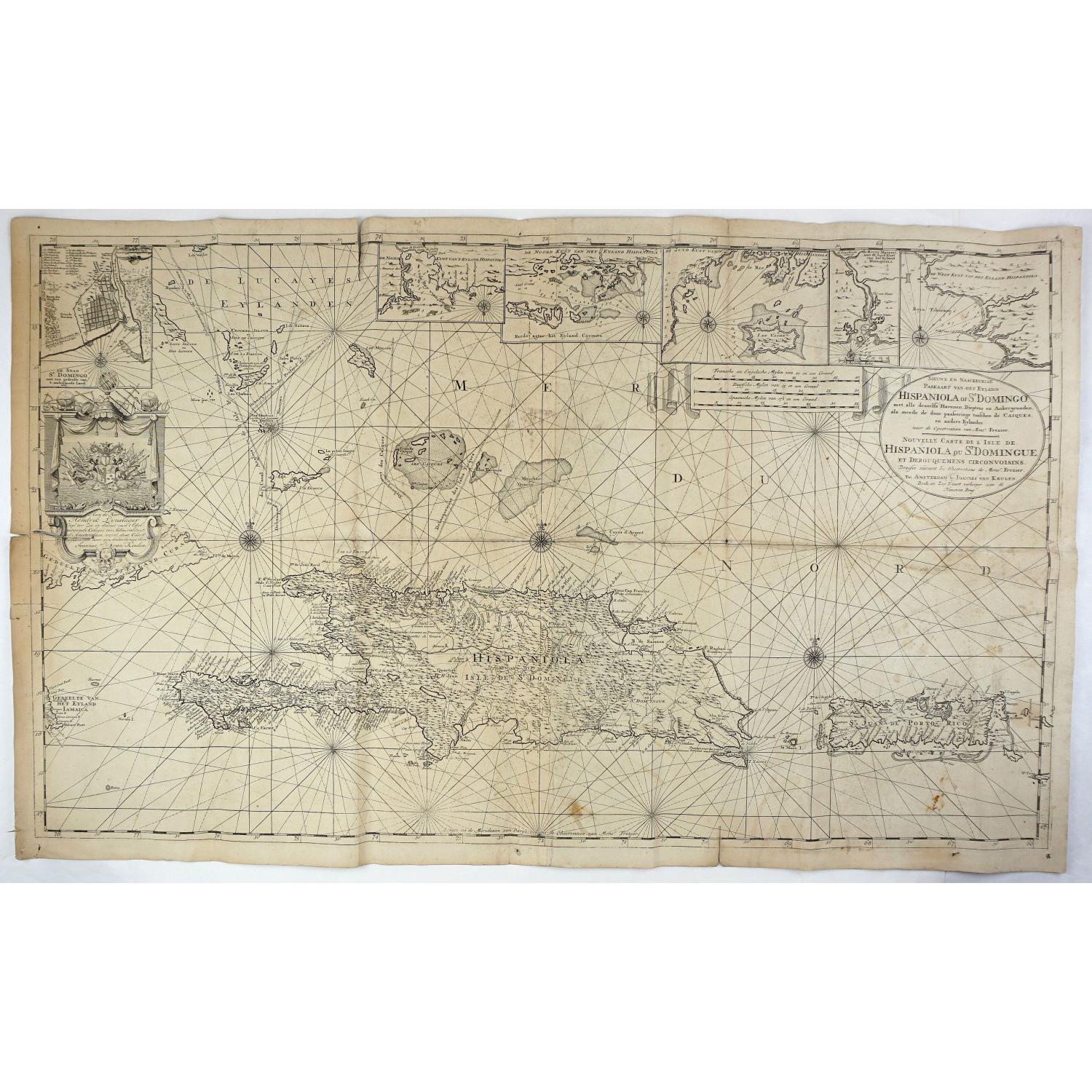 Nieuwe en Naaukeurige Paskaart van Het Eyland Hispaniola of St. Domingo met alle dresslss Havenen, Dieptens en Ankergronden, als meede de door passeeringe tusche de Caiques en andere Eylanden. naer de Opservatien van Monsr. Frezier. . .​
