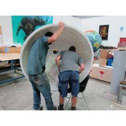 A unique 78 inches (2 meters) diameter relief globe shows the physical features under the oceans.